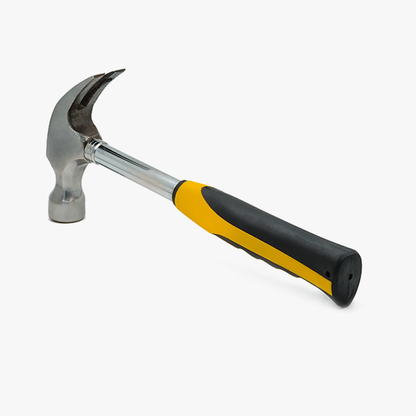 yellow hammer hand saw on wood